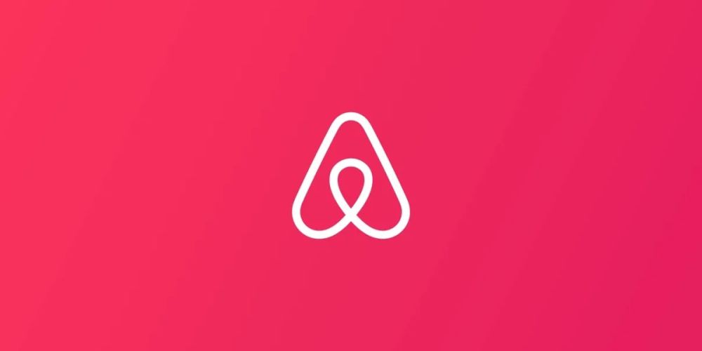 il logo della compagnia air bnb in rosa